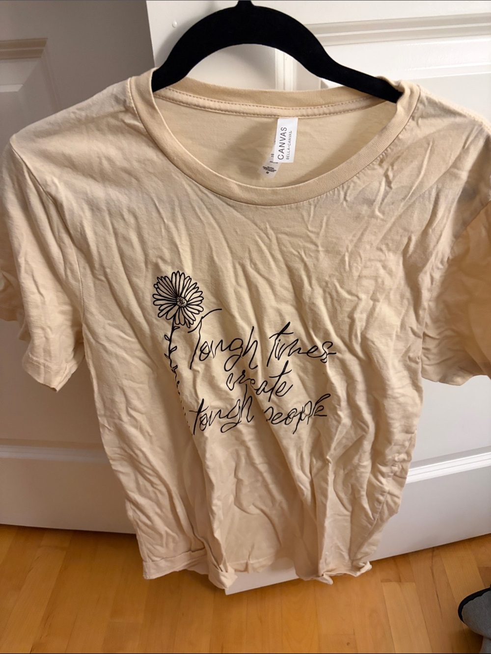 Bella Canvas Cream Short-Sleeve Tee with Black Daisy Script